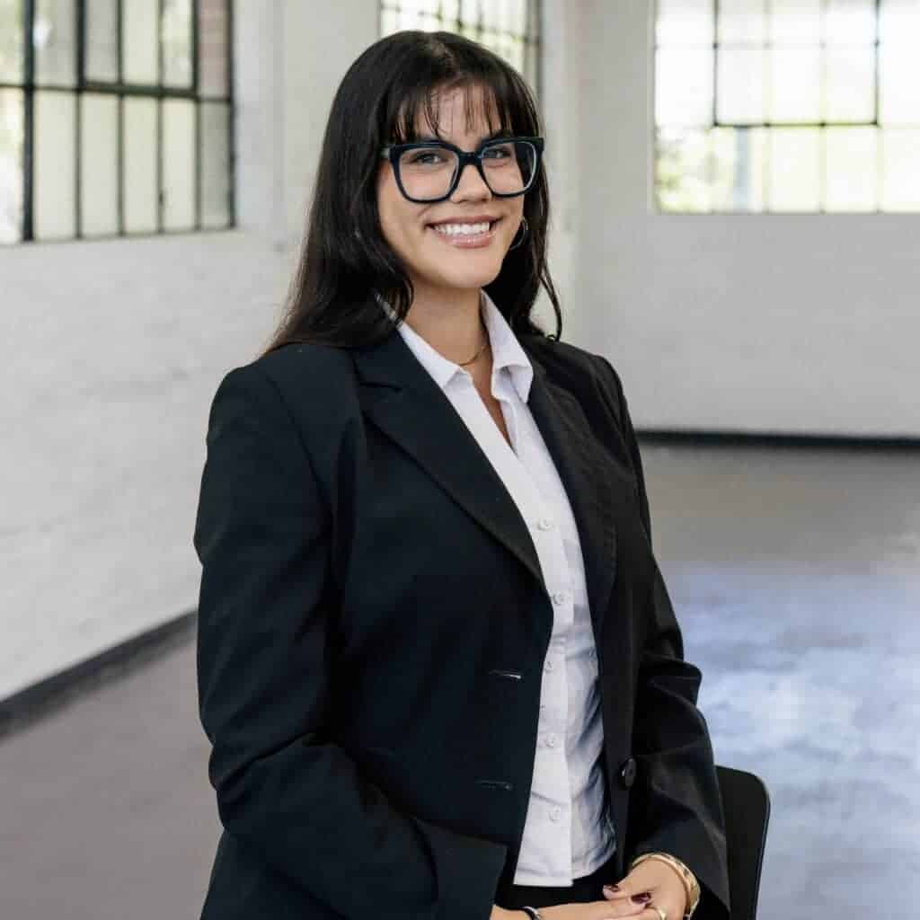 Charlotte Guesdon at Clairs Keeley Lawyer in Perth: Smiling professional in suit, specializing in Family & Commercial Law, Wills, and Estate Planning.